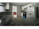 View of the kitchen boasting stainless steel appliances and granite countertops at 616 N Palm Ave, Kissimmee, FL 34741