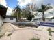 Outdoor pool area with a slide and grill at 616 N Palm Ave, Kissimmee, FL 34741