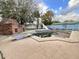 Outdoor pool area with a slide and grill at 616 N Palm Ave, Kissimmee, FL 34741