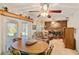 Inviting living room features a cozy fireplace and a sliding glass door at 706 Francis St, Kissimmee, FL 34741