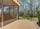 View of the back yard from the large, screened in patio at 741 Villa Park Rd, Poinciana, FL 34759