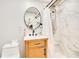 Bathroom with a marble tile shower and modern vanity at 78 N 5Th St, Orlando, FL 32833