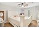 Bedroom with a ceiling fan and decorative headboard at 78 N 5Th St, Orlando, FL 32833