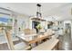 Elegant dining room with a large, well lit window and open to the kitchen at 78 N 5Th St, Orlando, FL 32833