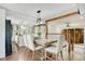 Inviting dining room with stylish decor, flows seamlessly into the kitchen, creating an open living space at 78 N 5Th St, Orlando, FL 32833