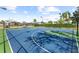 Beautiful community basketball court provides recreational opportunities for residents on a sunny day at 8063 King Palm Cir, Kissimmee, FL 34747