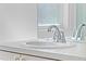 Close up on a faucet in the bathroom, showing a clean and well-maintained sink area at 8063 King Palm Cir, Kissimmee, FL 34747