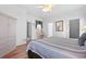 Bedroom with hardwood floors and neutral wall paint provides a peaceful and relaxing space at 8063 King Palm Cir, Kissimmee, FL 34747