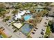 Aerial view of community amenities: pool, tennis courts, basketball, volleyball at 8063 King Palm Cir, Kissimmee, FL 34747