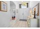Bright foyer with a double-door entry, tile flooring, and views into the adjacent rooms at 8063 King Palm Cir, Kissimmee, FL 34747