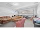Spacious garage with ample storage space, sofas, recreational games and sports equipment at 8063 King Palm Cir, Kissimmee, FL 34747