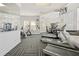 A well-equipped fitness center with treadmills, elliptical machines, and weightlifting equipment at 8063 King Palm Cir, Kissimmee, FL 34747