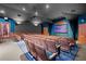 A cozy in-house movie theater with comfortable seating and a large projection screen at 8063 King Palm Cir, Kissimmee, FL 34747