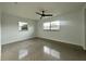 Bright, spacious bedroom with ample natural light and ceiling fan for comfort at 8212 Le Mesa St, Orlando, FL 32827