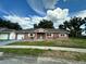 Charming single-story home with a well-manicured lawn and cozy exterior at 8212 Le Mesa St, Orlando, FL 32827