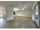 Open living room featuring a ceiling fan, and lots of space to relax and entertain at 8212 Le Mesa St, Orlando, FL 32827