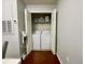 A laundry room features a washer and dryer, offering convenience and functionality at 8300 Elm Park Dr # 7110, Orlando, FL 32821