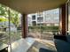 Relaxing screened patio with comfortable seating and serene views of the community at 8300 Elm Park Dr # 7110, Orlando, FL 32821