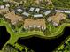 Community aerial view showing building, parking and green space surrounding the lake at 8300 Portofino Dr # 403, Davenport, FL 33896