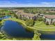 Aerial view of community featuring multiple ponds and beautiful landscaping at 8300 Portofino Dr # 403, Davenport, FL 33896