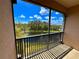 Relax on the balcony while enjoying calming lake views at 8300 Portofino Dr # 403, Davenport, FL 33896