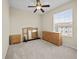 Bright bedroom with a ceiling fan, a window and closet with carpet flooring at 8300 Portofino Dr # 403, Davenport, FL 33896