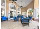 Elegant lobby with plush seating and neutral color scheme, creating a welcoming atmosphere at 8300 Portofino Dr # 403, Davenport, FL 33896