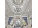 Lobby with high ceilings, a chandelier, and ample natural light shining through the windows at 8300 Portofino Dr # 403, Davenport, FL 33896