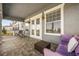 Balcony with outdoor seating and french doors, great for relaxing and enjoying the view at 861 Golden Bear Dr, Reunion, FL 34747