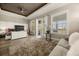 Bright main bedroom with private balcony access, wood floors and en suite bath at 861 Golden Bear Dr, Reunion, FL 34747