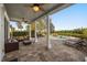 Relaxing outdoor patio features a pool, lounge chairs, and ample seating areas at 861 Golden Bear Dr, Reunion, FL 34747