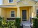 Inviting front porch with stone accents and lush landscaping at 1000 Seburn Rd, Apopka, FL 32703