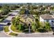 Charming yellow two-story home with well-manicured lawn and mature trees in a desirable neighborhood at 1000 Seburn Rd, Apopka, FL 32703
