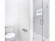 Bathroom featuring a toilet, towel bar, and a glass-enclosed shower at 110 Alta Vista Way, Davenport, FL 33837