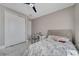 Clean bedroom with a closet, a desk area, and marble flooring at 1130 Pando Loop, Orlando, FL 32824