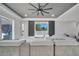 Cozy living room with a large sofa and TV, providing a comfortable entertainment space at 1130 Pando Loop, Orlando, FL 32824