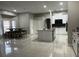 Bright, open kitchen featuring a central island, modern appliances, and a breakfast nook at 1201 Providence Blvd, Kissimmee, FL 34744