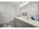 Bright bathroom with double sinks, ample countertop space, and modern fixtures for enhanced convenience at 151 Flatfish Ct, Poinciana, FL 34759