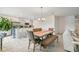 Stylish dining area adjacent to the kitchen, featuring a table and bar seating for casual meals at 151 Flatfish Ct, Poinciana, FL 34759