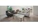 Spacious living room with tile flooring, comfortable seating, and a seamless flow to the kitchen at 151 Flatfish Ct, Poinciana, FL 34759