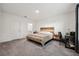 Main bedroom features ensuite bathroom and carpet floors at 151 Flatfish Ct, Poinciana, FL 34759