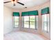 Cozy bedroom featuring natural light, and views of the outdoors, perfect for relaxation and rest at 153 Ventana Dr, Poinciana, FL 34759