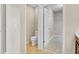 Bathroom with tile floors, toilet, and walk in closet at 1578 Softshell St, St Cloud, FL 34771