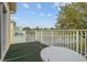 Private balcony with a scenic view of the lake at 1717 Retreat Cir, Clermont, FL 34714