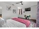 Comfortable bedroom with bright lighting, ceiling fan and ample space at 1717 Retreat Cir, Clermont, FL 34714