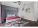Serene main bedroom with a plush bed, modern decor and ample natural light at 1717 Retreat Cir, Clermont, FL 34714