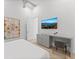 Light-filled bedroom complete with a workspace and relaxing atmosphere at 2117 Pine Oak Loop, Davenport, FL 33837