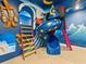 Themed bedroom with custom mural, slide, and imaginative decor at 2117 Pine Oak Loop, Davenport, FL 33837