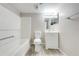 This full bath offers a shower-tub combo, modern vanity, and neutral finishes at 2210 Yankee Pl # 334, Orlando, FL 32839