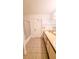 Bathroom featuring double sinks, tile floor, and bathtub with sliding glass door at 2235 Emperor Dr, Kissimmee, FL 34744